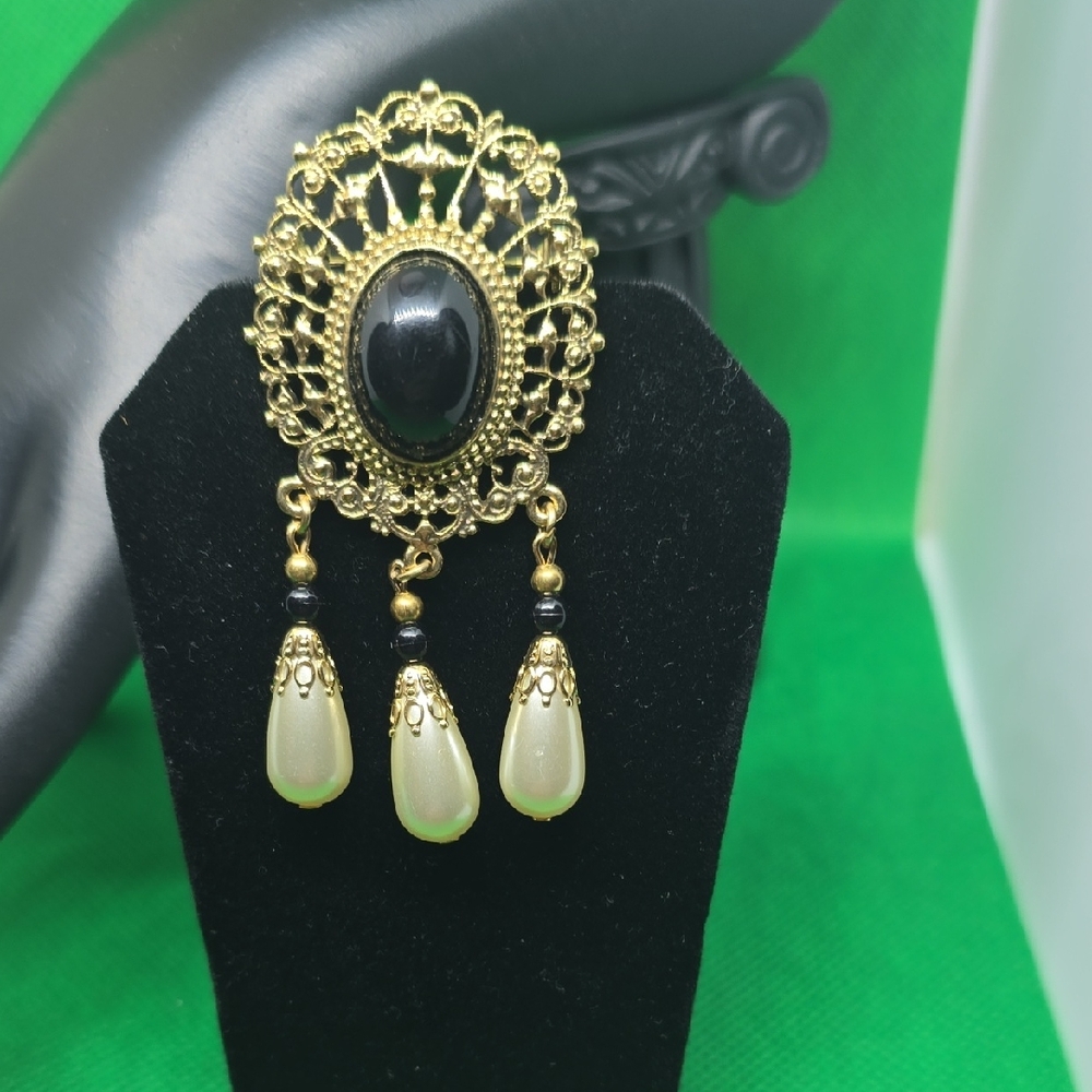 Elegant Gold and Black Dangle Earrings